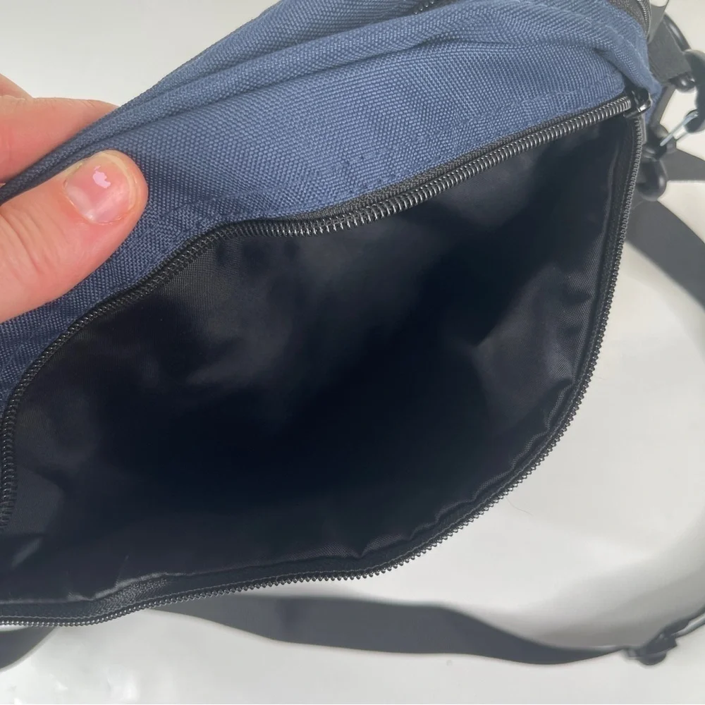 Poler Navy Round Shoulder Bag